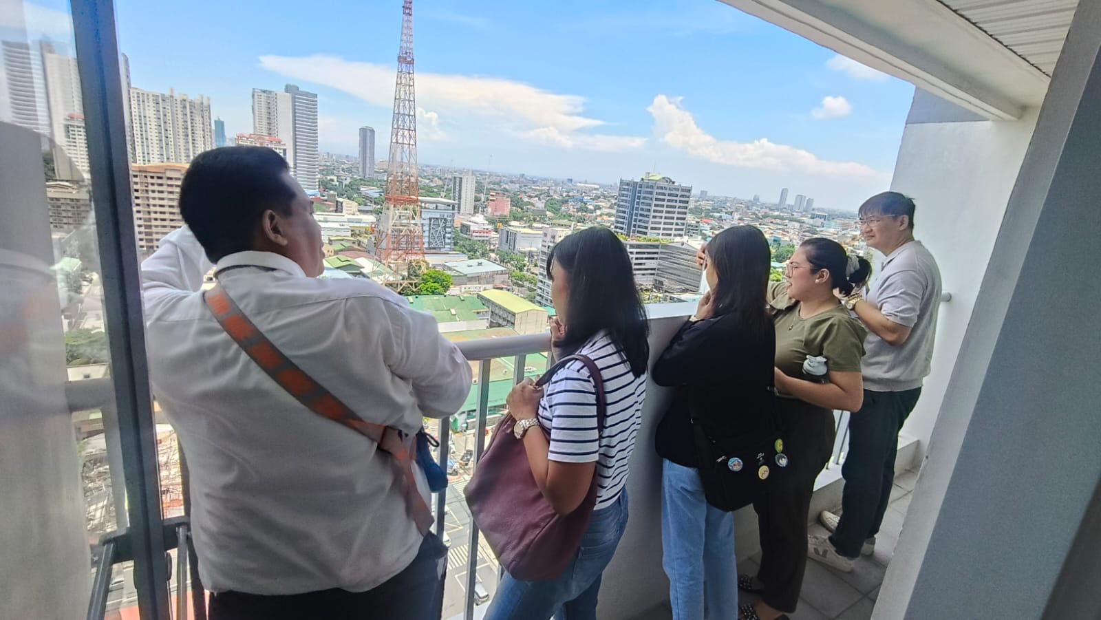 Quezon City view from a Future Point Plaza Suites balcony